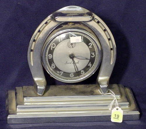 Lux Good Luck novelty alarm: — Antique Clocks Price Guide