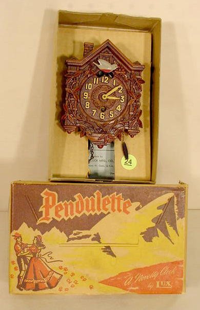 Lux No. 301 Bluebird pendulette with box: — Antique Clocks Price Guide