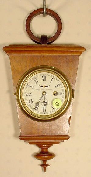 Gilbert Masonic walnut hanging clock: — Antique Clocks Price Guide