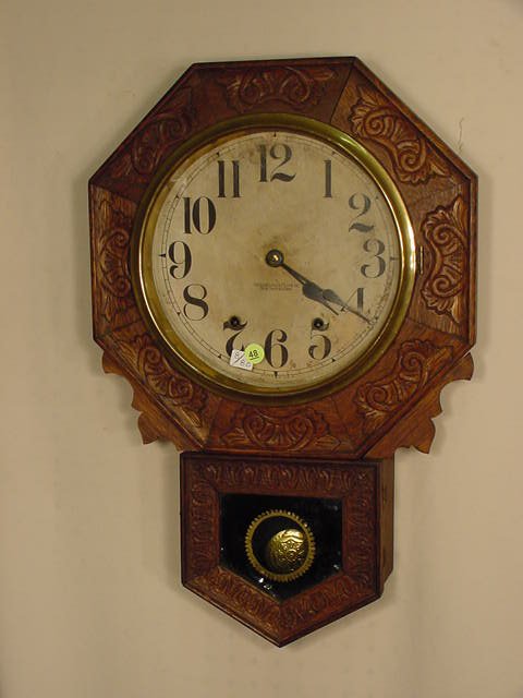 New Haven pressed oak hanging regulator: — Antique Clocks Price Guide