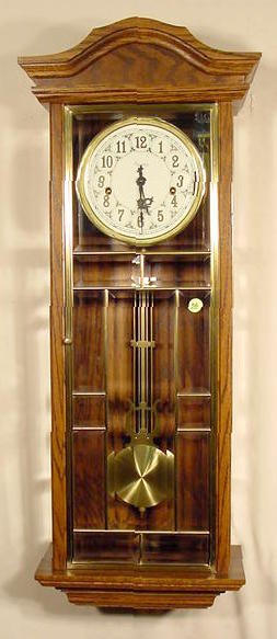 Ansonia Gold Medallion chiming wall clock: — Antique Clocks Price Guide