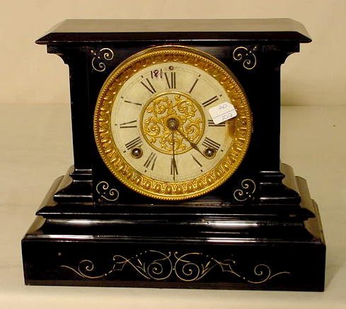 Ansonia iron case table clock. — Antique Clocks Price Guide