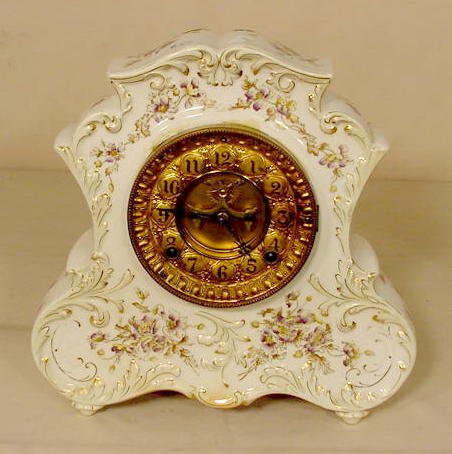 Ansonia china case clock: — Antique Clocks Price Guide