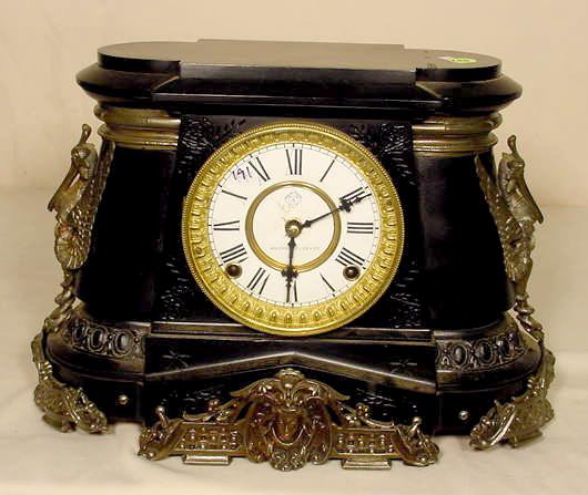 Ansonia Pompeii iron case mantle clock: — Antique Clocks Price Guide