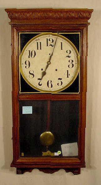 Waterbury Stork 30 day oak regulator. — Antique Clocks Price Guide
