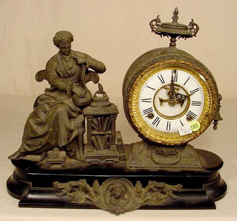 Ansonia Newton statue clock: — Antique Clocks Price Guide