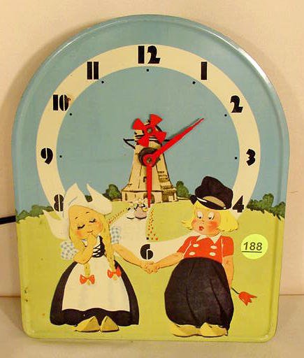 Electric tin litho Dutch scene clock: — Antique Clocks Price Guide