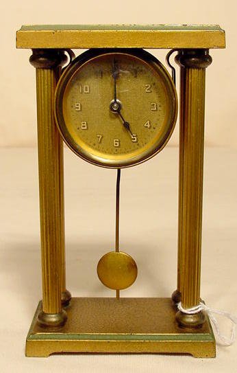 Lux 4 column desk clock: nice original finish metal clock. — Antique Clocks Price Guide
