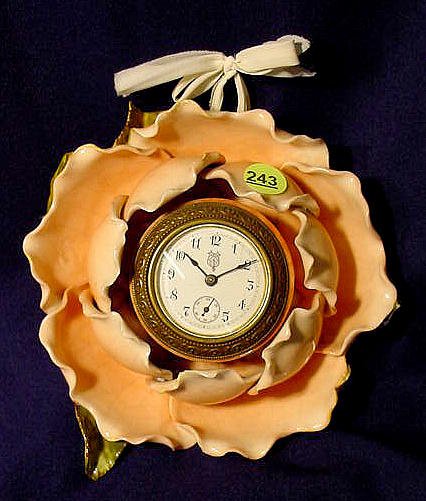 B.D. china cased flower hanging clock. — Antique Clocks Price Guide
