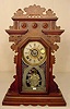 Ingraham walnut parlor clock: with alarm; original finish.