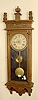 Waterbury spring driven oak hanging clock. 