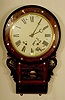 Seth Thomas inlaid rosewood wall clock: