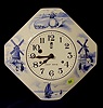 Irving Miller Dutch scene 8 day porcelain plate clock. 