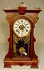 Waterbury walnut parlor clock with alarm. 