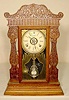 Gilbert No. 3207 pressed oak kitchen clock. 