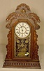 Ansonia pine case parlor clock. 