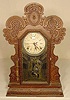 Ingraham Gila oak calendar shelf clock.