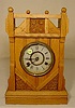 Oak shelf clock: time & strike.