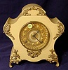 Ansonia iron case mantle clock. 