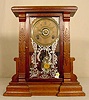 Ingraham walnut shelf clock with alarm: