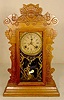 Waterbury walnut shelf clock with calendar: 