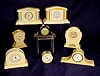 Collection of 8 celluloid case clocks: