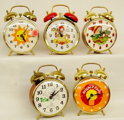 Group of 5 Food Advertising Alarm Clocks — Antique Clocks Price Guide
