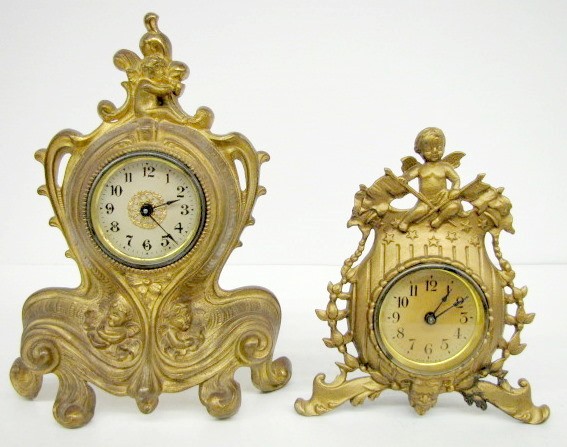 2 Cherub Metal Novelty Clocks — Antique Clocks Price Guide