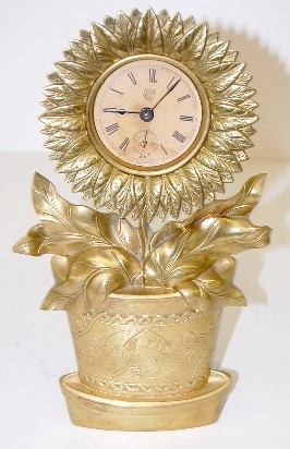 Waterbury Metal Potted Plant Novelty Clock — Antique Clocks Price Guide