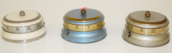 Group of 3 Metal Tape Measure Clocks — Antique Clocks Price Guide