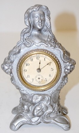Metal Art Nouveau Cherub Novelty Clock — Antique Clocks Price Guide