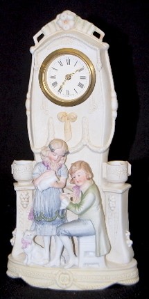 German Bisque Children and Cat Clock — Antique Clocks Price Guide
