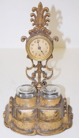 Cast Iron Lux Ink Stand Clock — Antique Clocks Price Guide