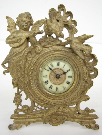 Ansonia Cherub and Bird Metal Novelty Clock — Antique Clocks Price Guide