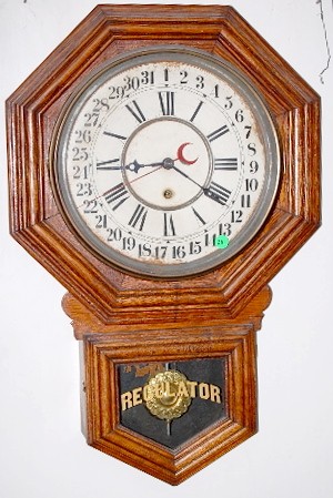 Sessions Oak Short Drop Calendar Clock — Antique Clocks Price Guide