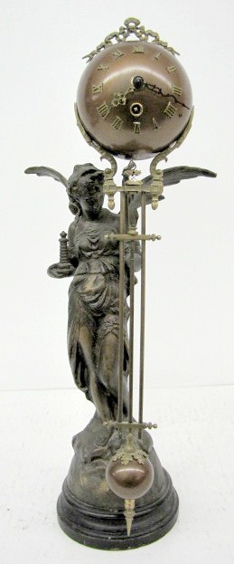 German Angel Swinging Ball Clock — Antique Clocks Price Guide