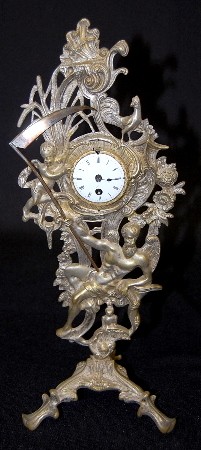 Silver Plated "Old Father Time" Novelty Clock — Antique Clocks Price Guide