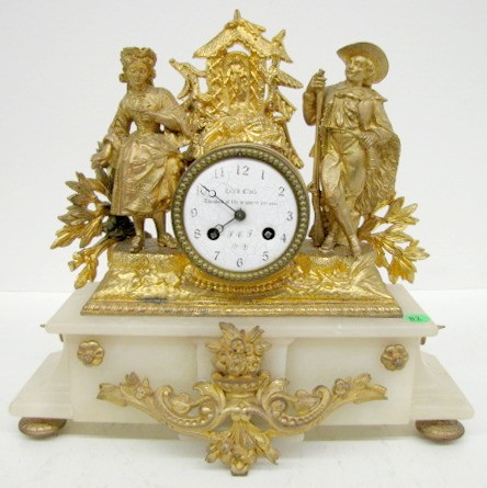 Marble and Metal Statue Clock — Antique Clocks Price Guide