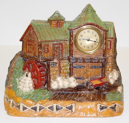 Lux Carved Figural Flour Mill Clock — Antique Clocks Price Guide