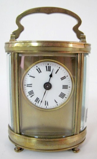8 Day French Carriage Clock in Oval Case — Antique Clocks Price Guide