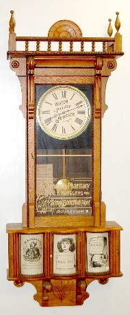 Ornate Carved Oak Sidney Advertising Clock — Antique Clocks Price Guide