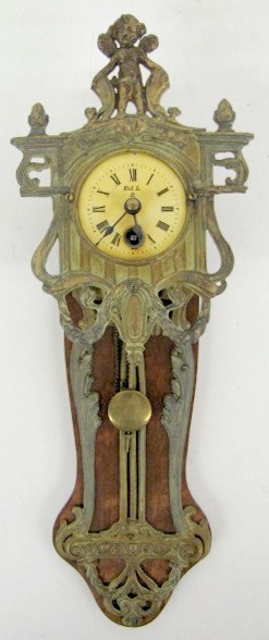 German Metal Hanging Cherub Clock — Antique Clocks Price Guide