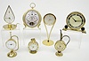 Group of 7 Brass Novelty Desk and Alarm Clocks