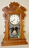 Waterbury "Gibson" Walnut Carved Kitchen Clock