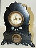 Small Inlaid Iron Front Clock