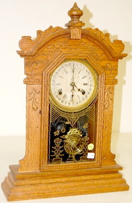 Waterbury Oak Calendar Clock — Antique Clocks Price Guide