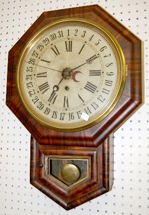 E.N. Welch Rosewood Calendar Schoolhouse Clock — Antique Clocks Price Guide