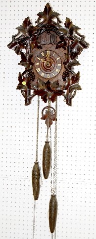 Black Forest Carved Cuckoo w/ Grapes and Leaves — Antique Clocks Price Guide
