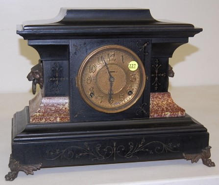 Enamel Marbleized Lion Head Mantle Clock — Antique Clocks Price Guide