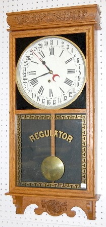 Ingraham Oak Calendar Store Regulator Clock — Antique Clocks Price Guide